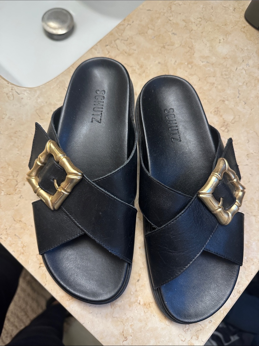 SCHUTZ Black Leather Crisscross Slide Mules with Gold Buckle